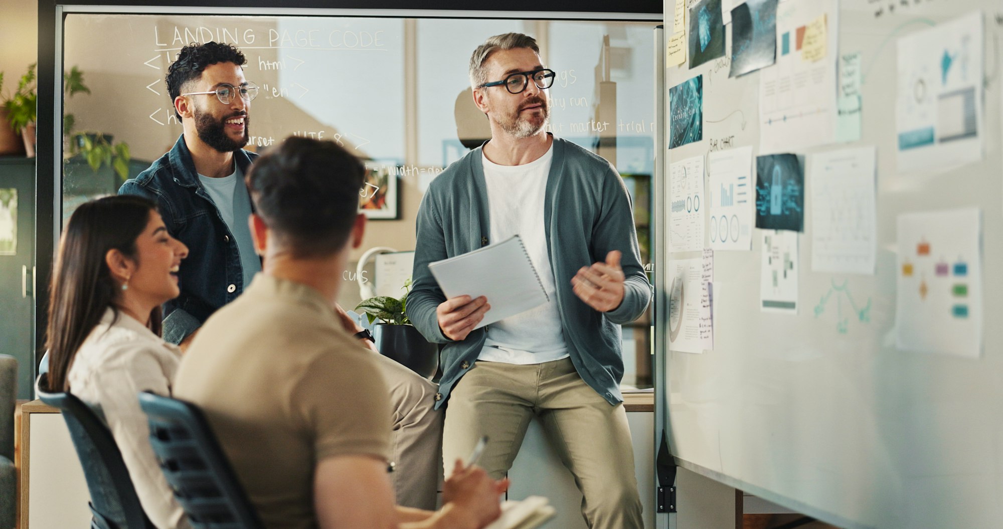 Office Workers Looking At Framework