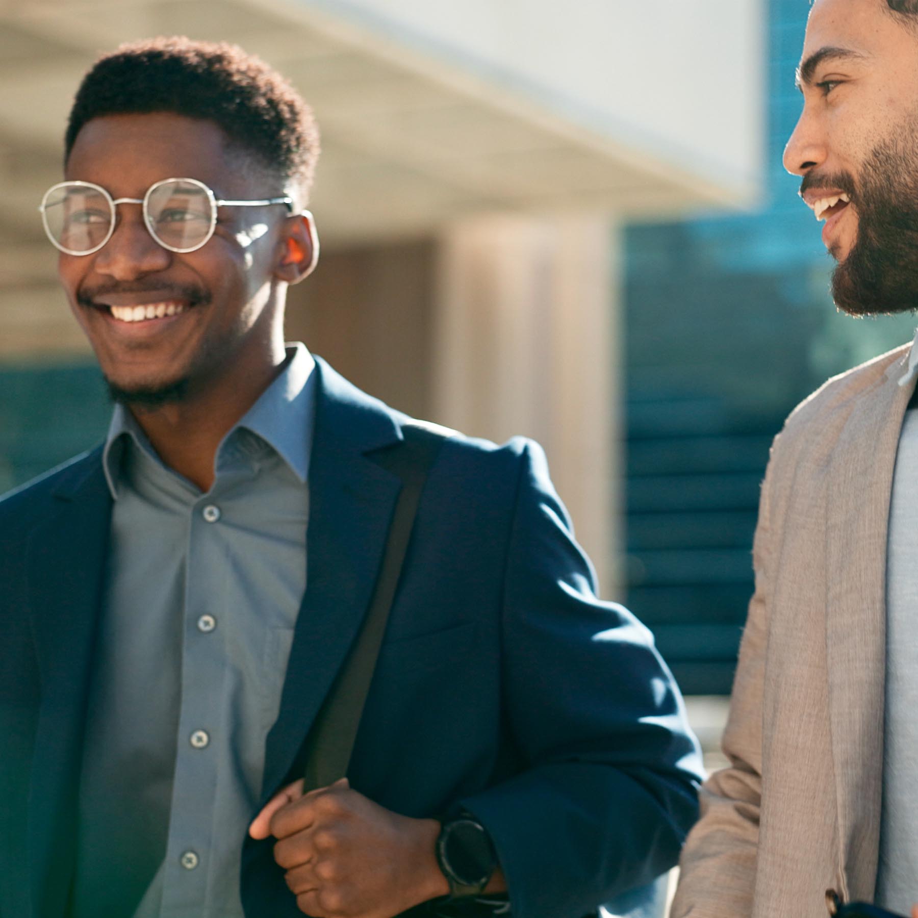 Colleagues on way to work smiling