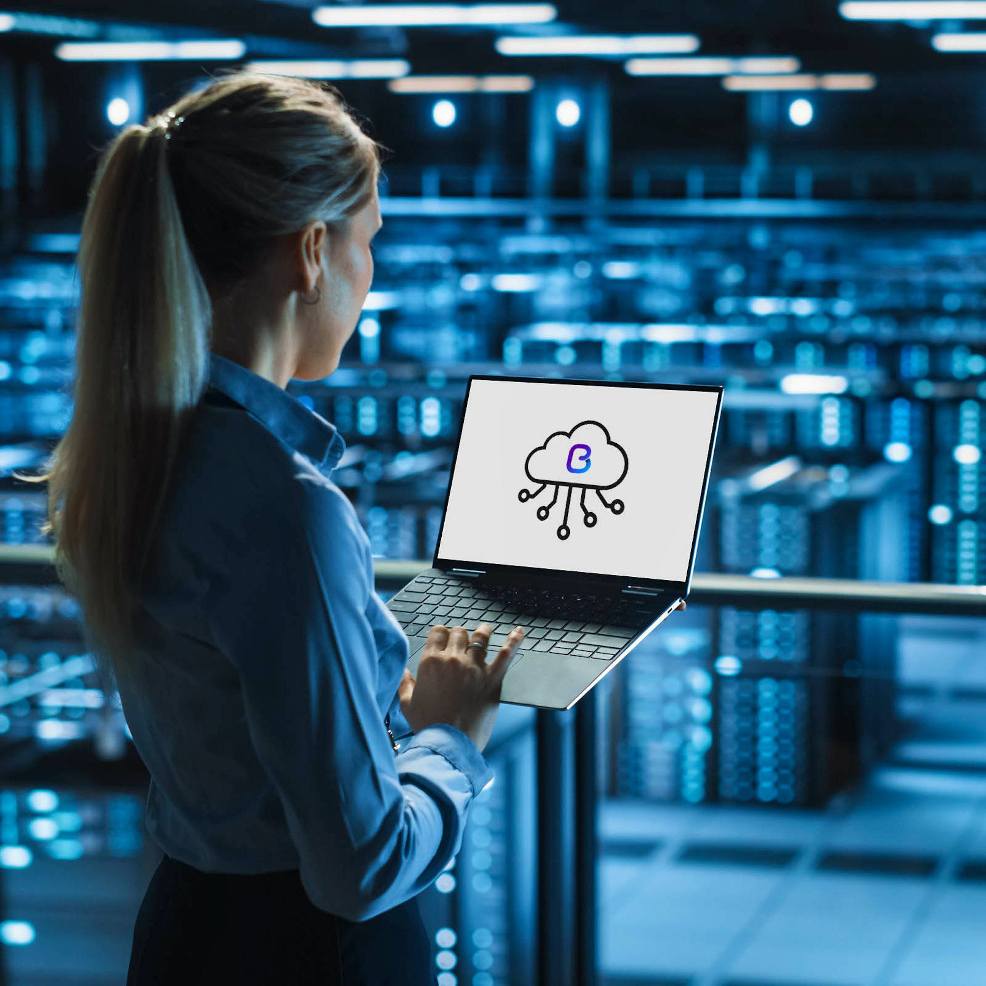 Woman on Laptop with Britannic Cloud Logo