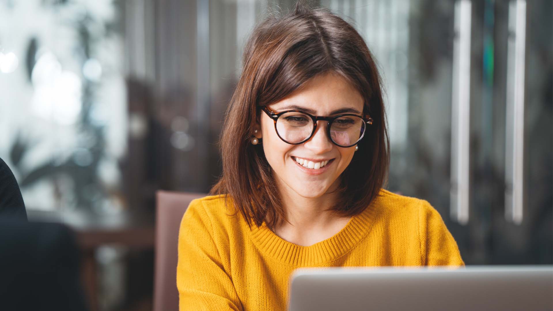 Customer female with glasses smiling
