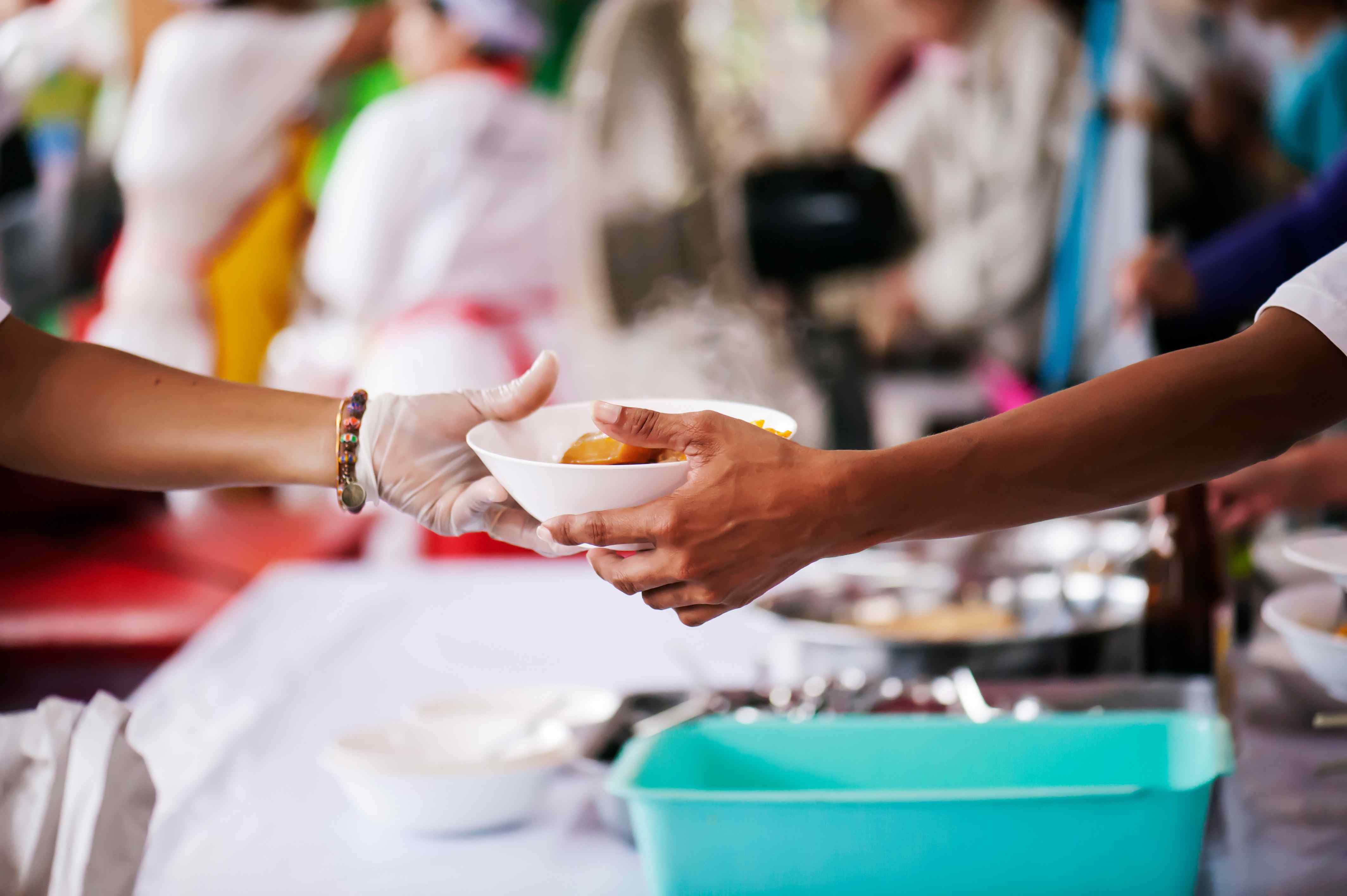 Passing a bowl of food