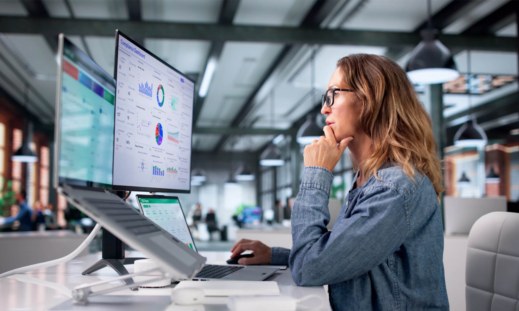 woman looking at computer screne