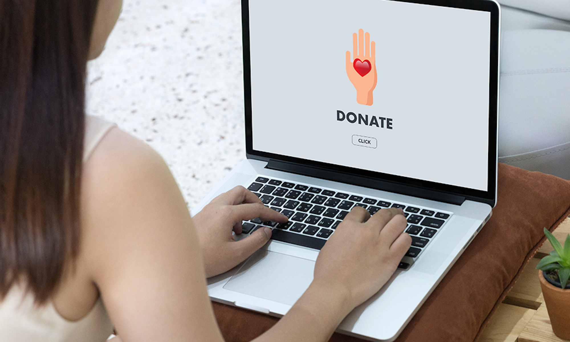 Laptop with donate for charity