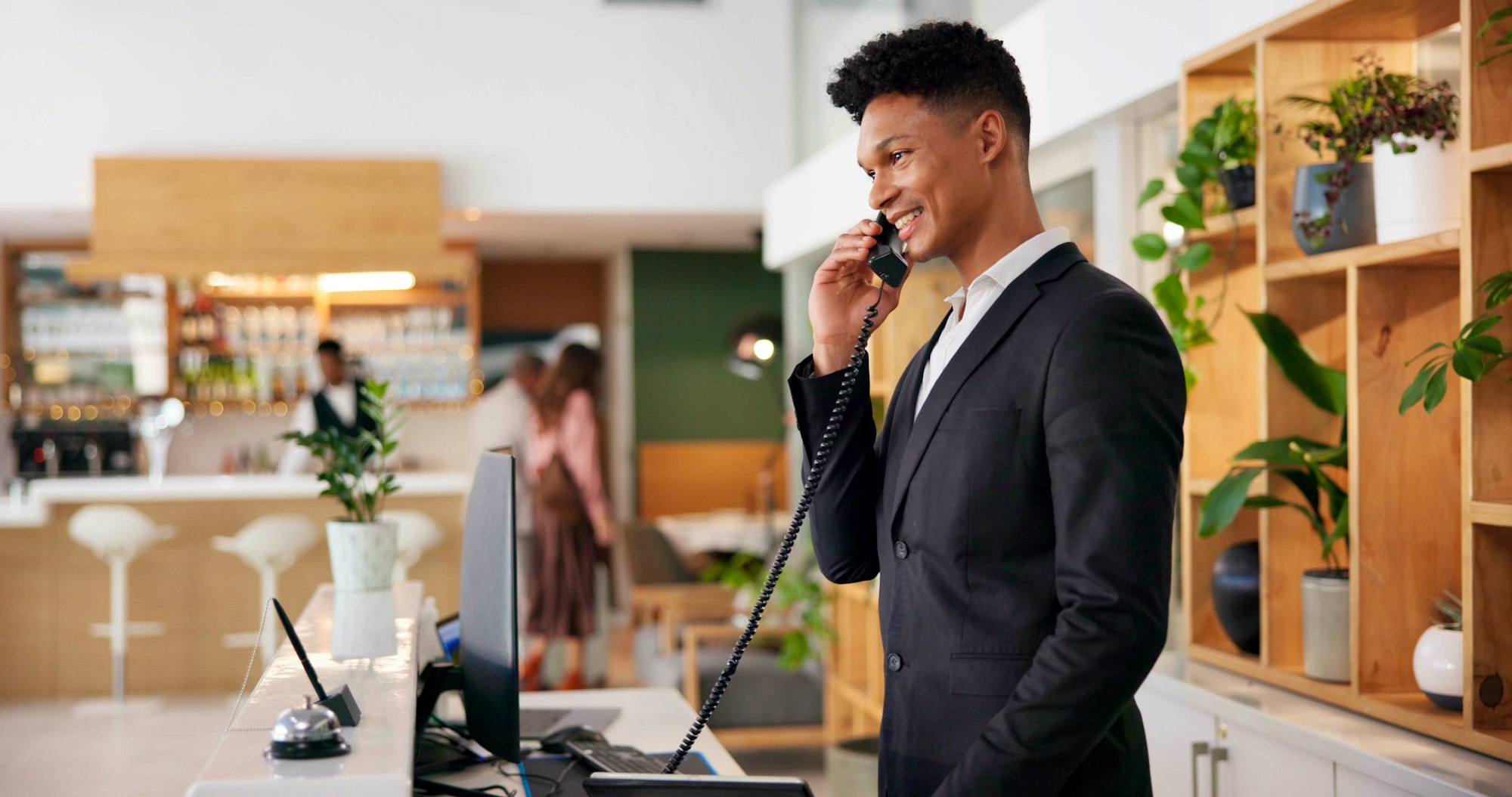 Woman On Ipad And HeadPhones In Hotel Room