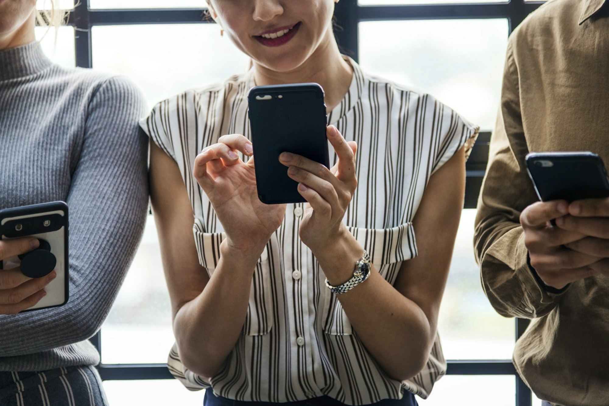 Woman on phone smiling