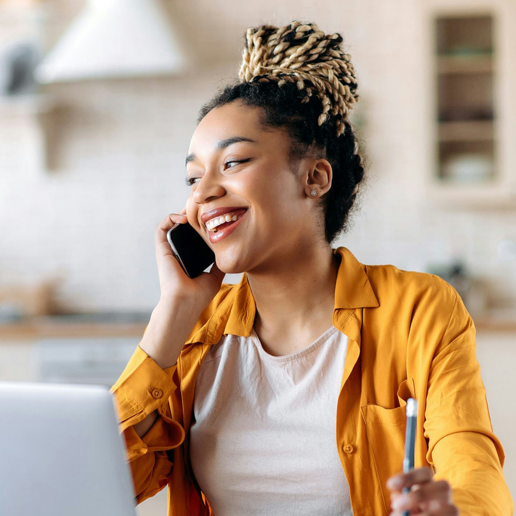 Lady on phone laughing