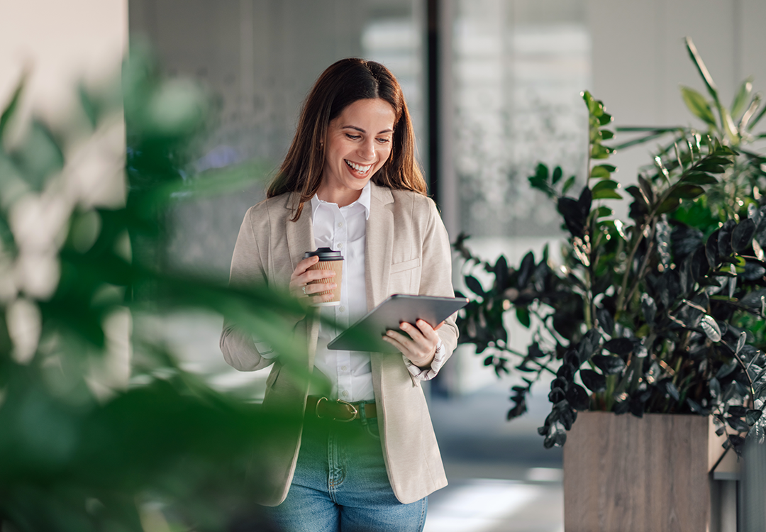 Office Worker On UC Phone Happy